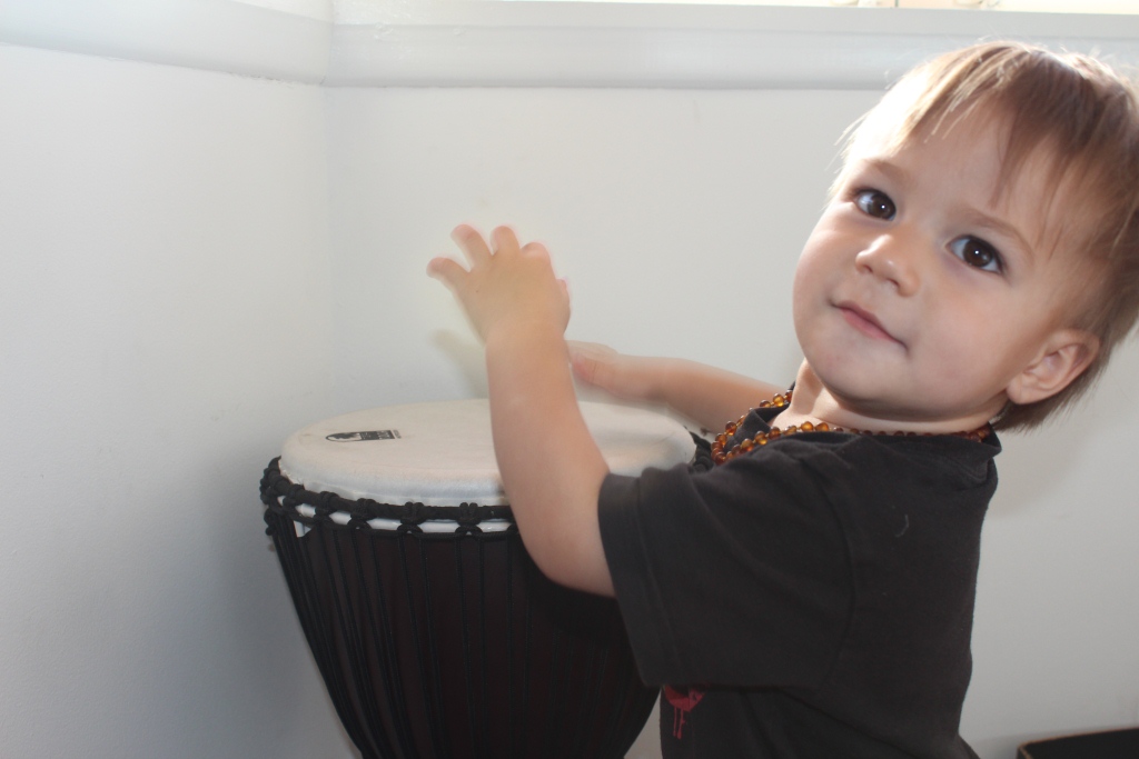 One year old Zavian playing the drums